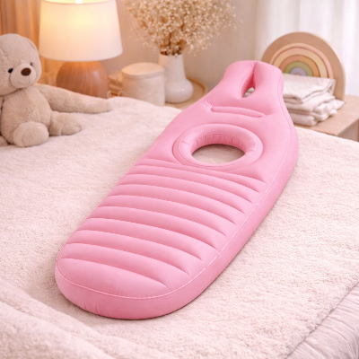 coussin-de-grossesse-gonflable-rose-chambre-lit