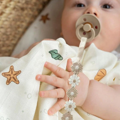 Attache-tetine-daisy-securitaire