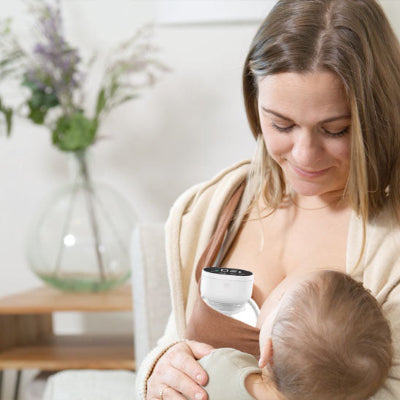 tire-lait-electrique-adi-blanc-maman-cuisine-bebe-dort