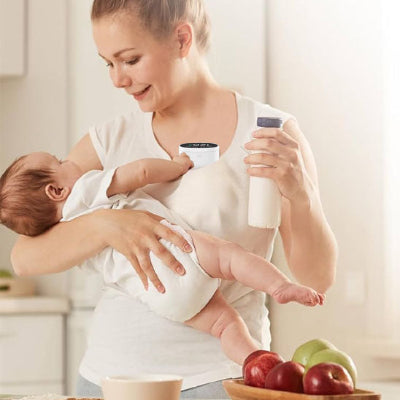 tire-lait-electrique-adi-blanc-maman-cuisine-bebe-joue